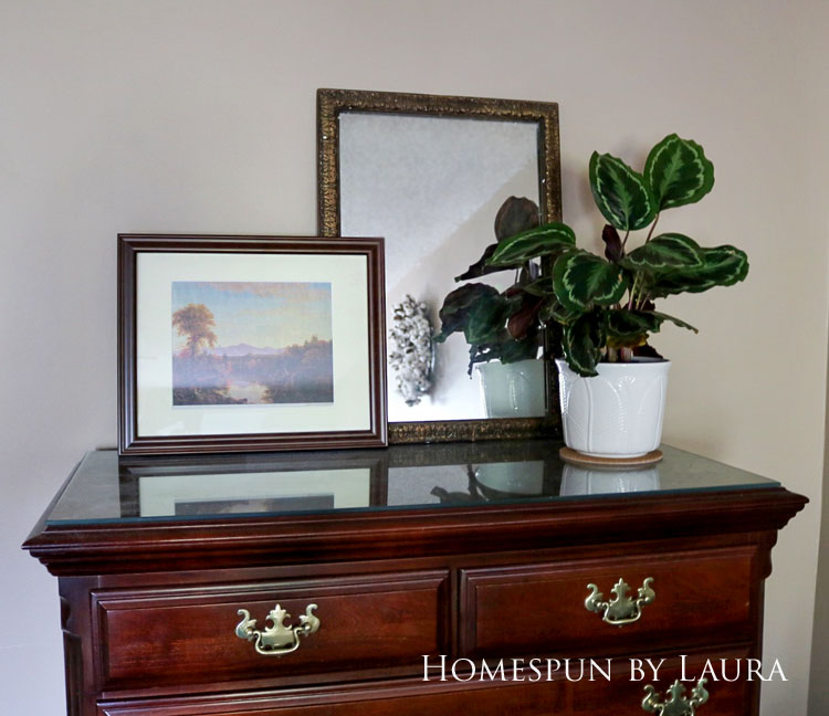 Master bedroom refresh | Homespun by Laura | Dresser with decor - plant, art, and mirror