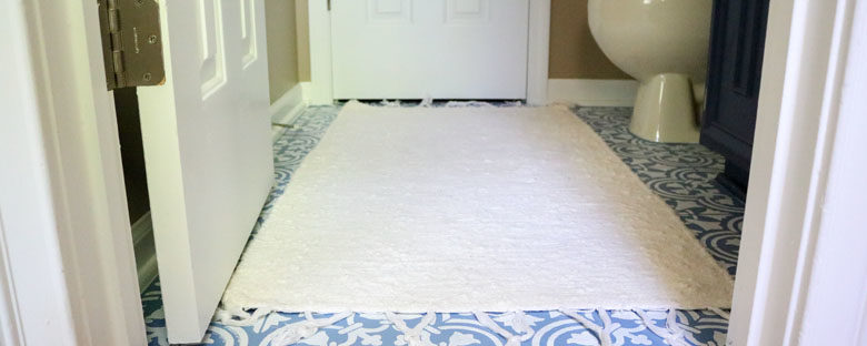 $75 DIY Powder Room (and Pantry!) Update: One Room Challenge Week 3 | Homespun by Laura | Painting a linoleum floor with Cutting Edge "Augusta" stencil: The After