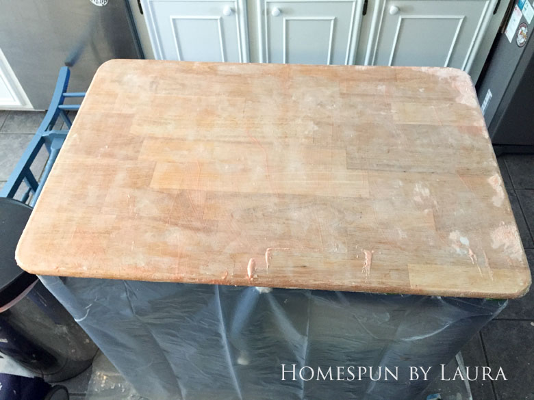 Stripping the faux painted marble finish down to original butcher block on my navy kitchen island | Homespun by Laura