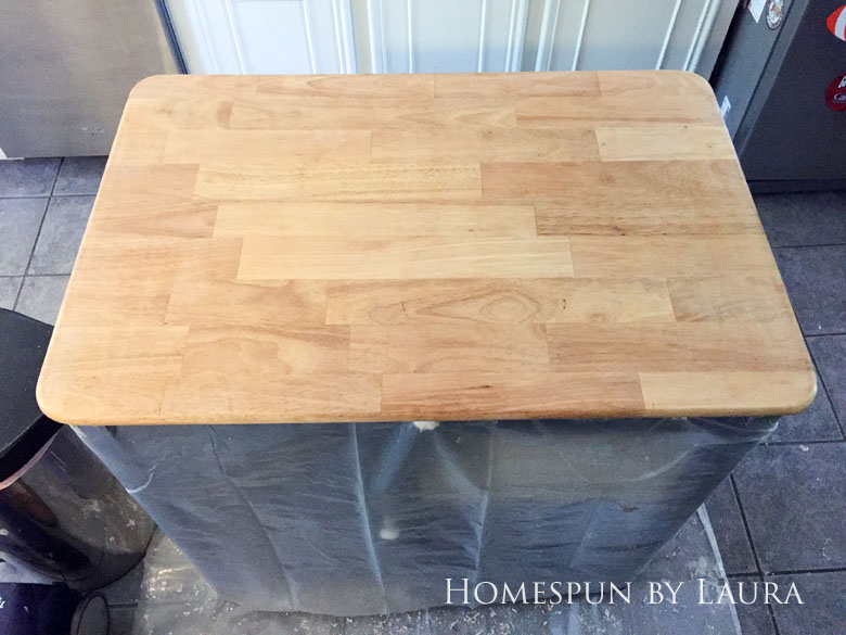 Stripping the faux painted marble finish down to original butcher block on my navy kitchen island | Homespun by Laura