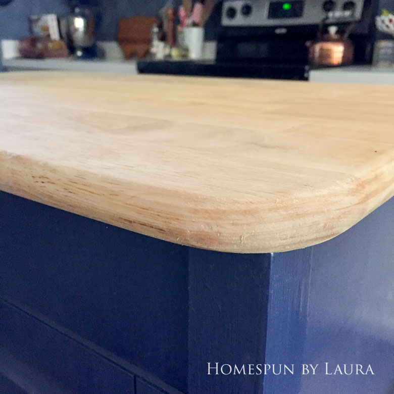 Stripping the faux painted marble finish down to original butcher block on my navy kitchen island | Homespun by Laura