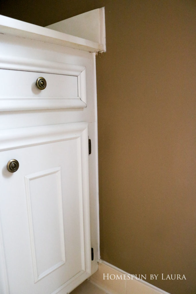 Replacing old caulk makes a dramatic impact in a bathroom. | Homespun by Laura