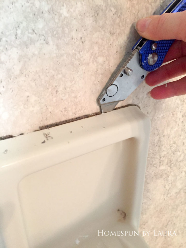 How to replace old caulk for a dramatic impact in a bathroom. | Homespun by Laura