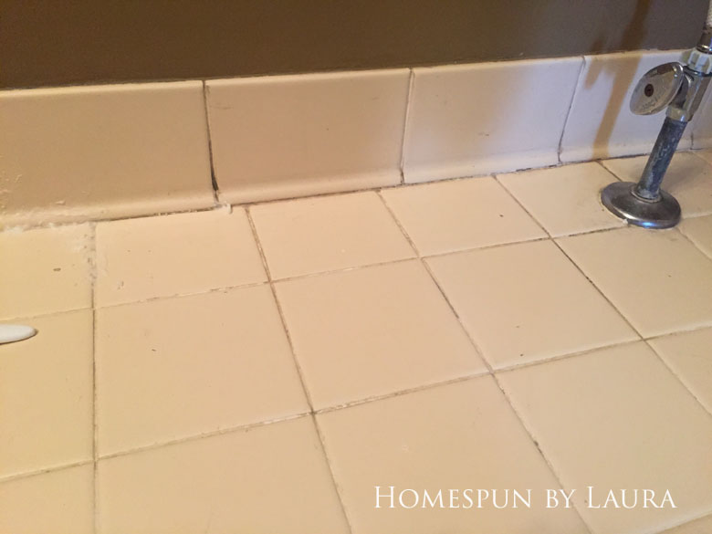 Cleaning the floor grout with bleach pen and bleach + baking soda paste wasn't fun but was worth it (before)