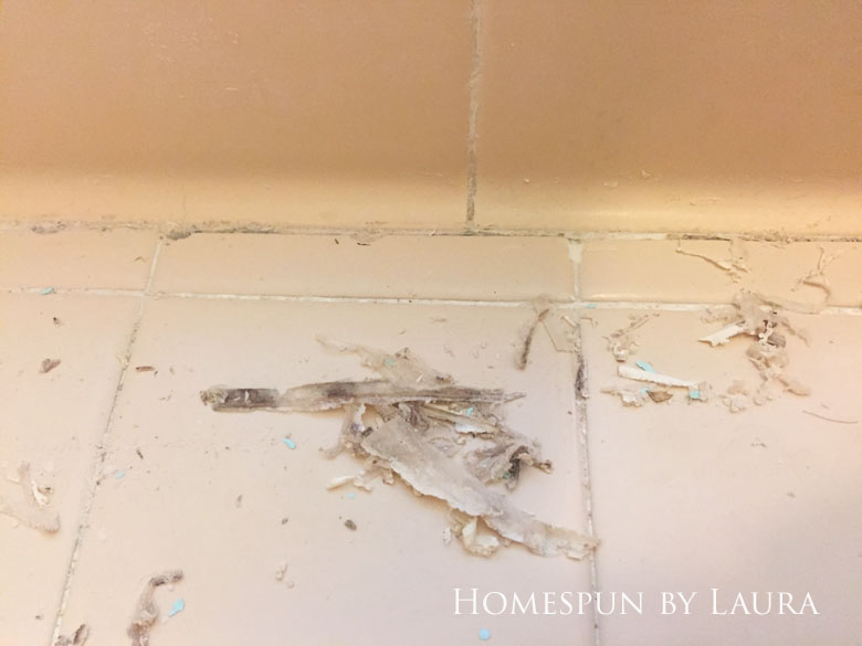 Removing the old caulk and replacing it with fresh, clean lines makes an instant impact (Before)
