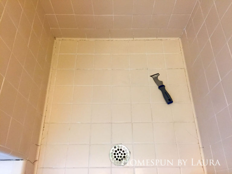 The $200 Master Bathroom Refresh | Homespun by Laura | Removing the old caulk and replacing it with fresh, clean lines makes an instant impact (Before)