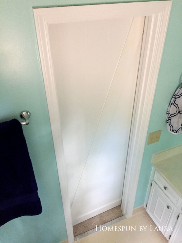Master bedroom refresh | Homespun by Laura | The master bathroom: Our DIY barn door gives so much more space to our tiny bathroom!